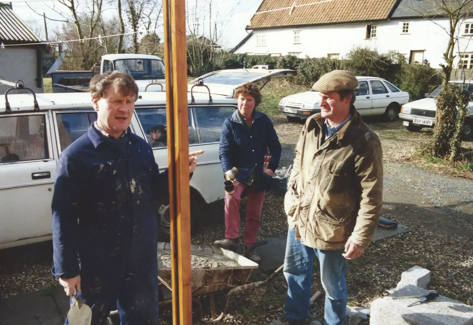 Bernie eyes up a door frame, from Bernie and the Porch, The Stables, Stuston, Suffolk - 15th March 1991