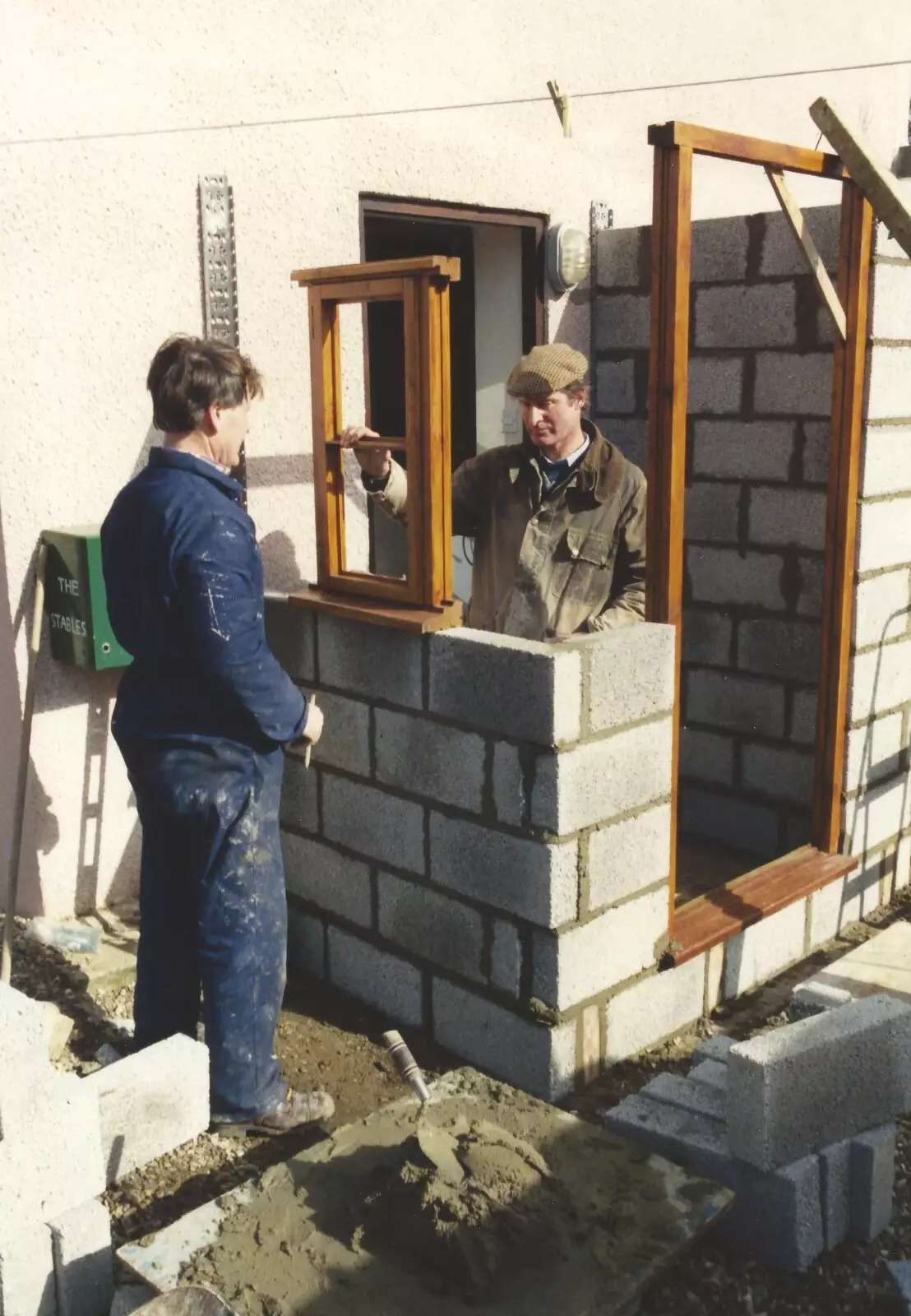 Geoff holds a window up, from Bernie and the Porch, The Stables, Stuston, Suffolk - 15th March 1991