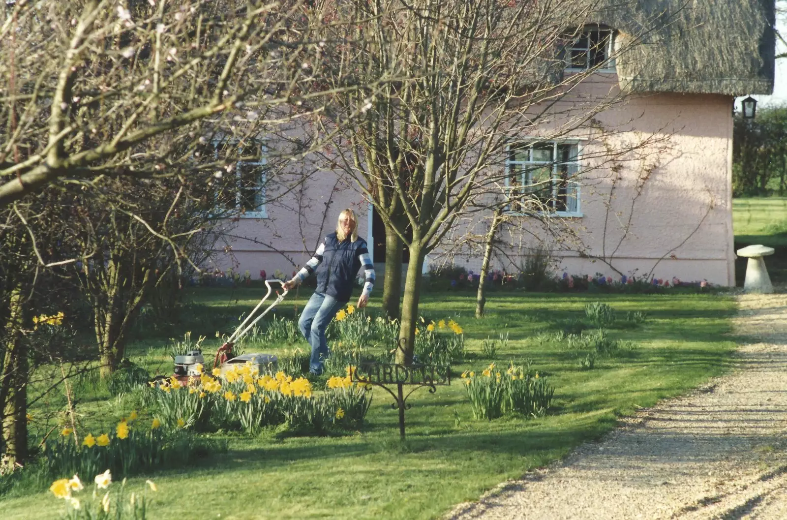 'Mad' Sue is mowing the lawn, from Bernie and the Porch, The Stables, Stuston, Suffolk - 15th March 1991