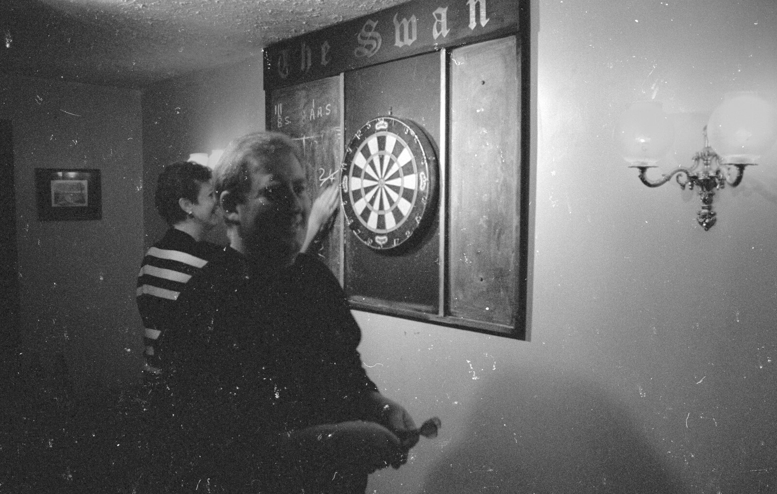 Tony Hoskins plays darts in the Swan from Darts at the Swan Inn and a Nigel Party, Lancaster Gate - 23rd March 1991