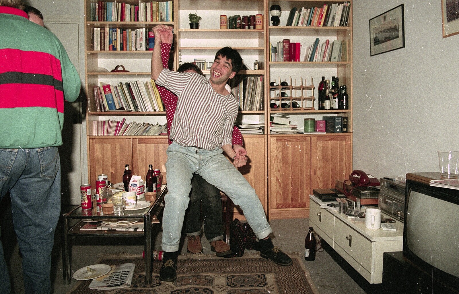 Nigel dances near his bookcase from Darts at the Swan Inn and a Nigel Party, Lancaster Gate - 23rd March 1991