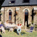 Grandmother, Mother and Mike in the garden getting some rare Dartmoor sunshine