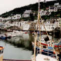 Boats and houses crowd Brixham harbour