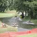 A bunch of hovercraft head down a flooded field, Riki and Dave in Chinatown, and Racing Hovercraft, London and Suffolk - 12th June 1991