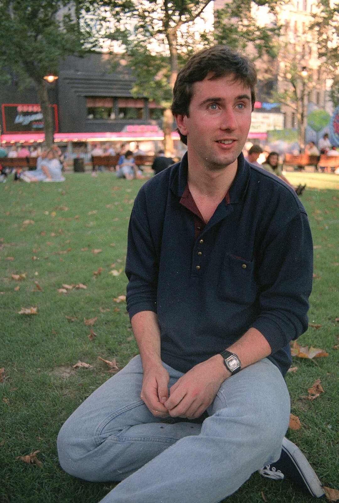 Riki sits in a park in Leicester Square from Riki and Dave in Chinatown, and Racing Hovercraft, London and Suffolk - 12th June 1991