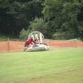1991 A hovercraft gets a push up a hill