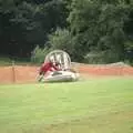 A hovercraft gets a push up a hill, Riki and Dave in Chinatown, and Racing Hovercraft, London and Suffolk - 12th June 1991