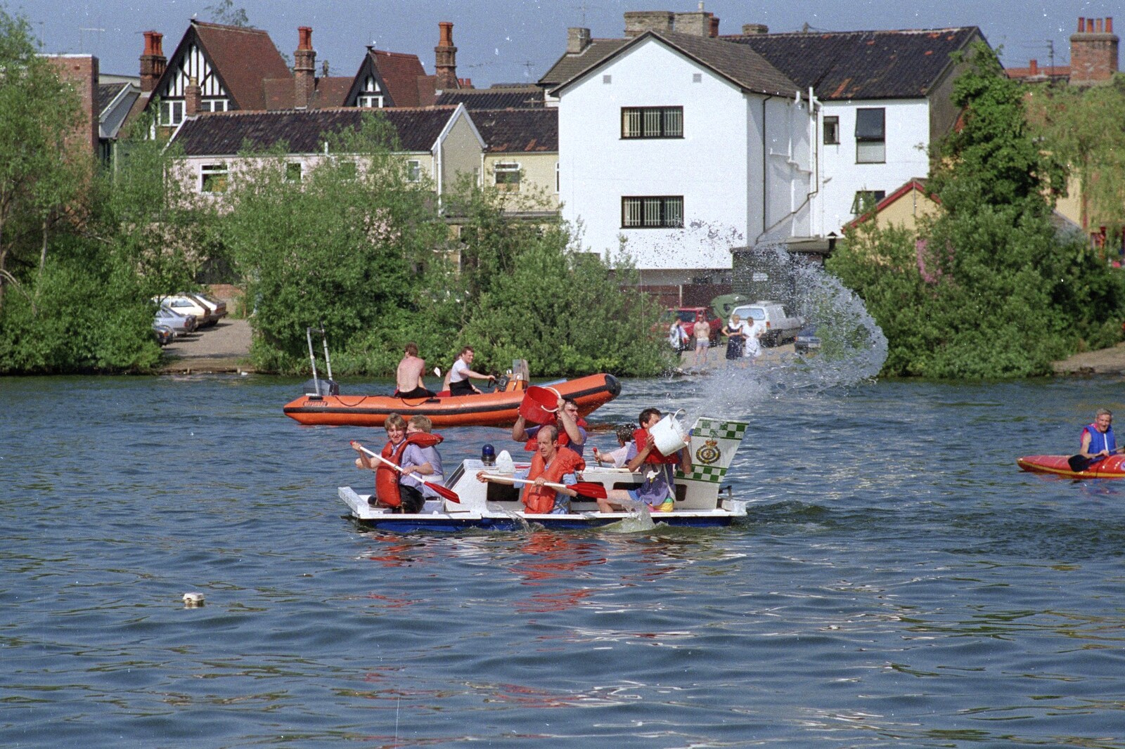 The ambulance team throws buckets of water  from The Diss Raft Race, Diss Mere, Norfolk - 6th July 1991