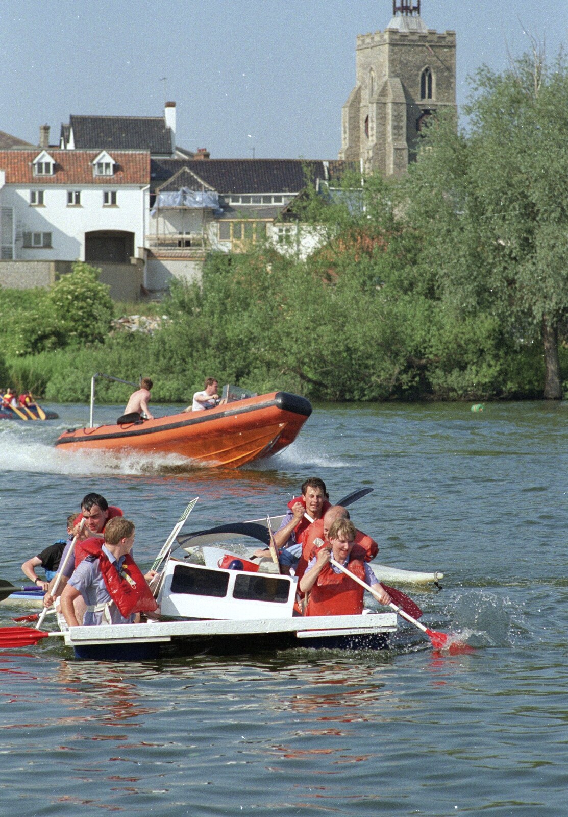 A RIB powers around rescuing stragglers from The Diss Raft Race, Diss Mere, Norfolk - 6th July 1991