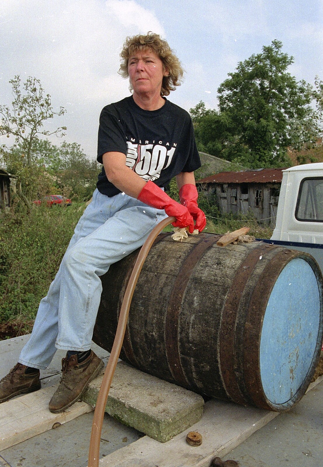 Brenda fills up a barrel from Cider Making, Stuston, Suffolk - 14th October 1991