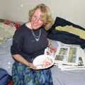 Liz looks at Nosher's photos, Nigel's Party and Hyde Park, Lancaster Gate, London - 16th October 1991