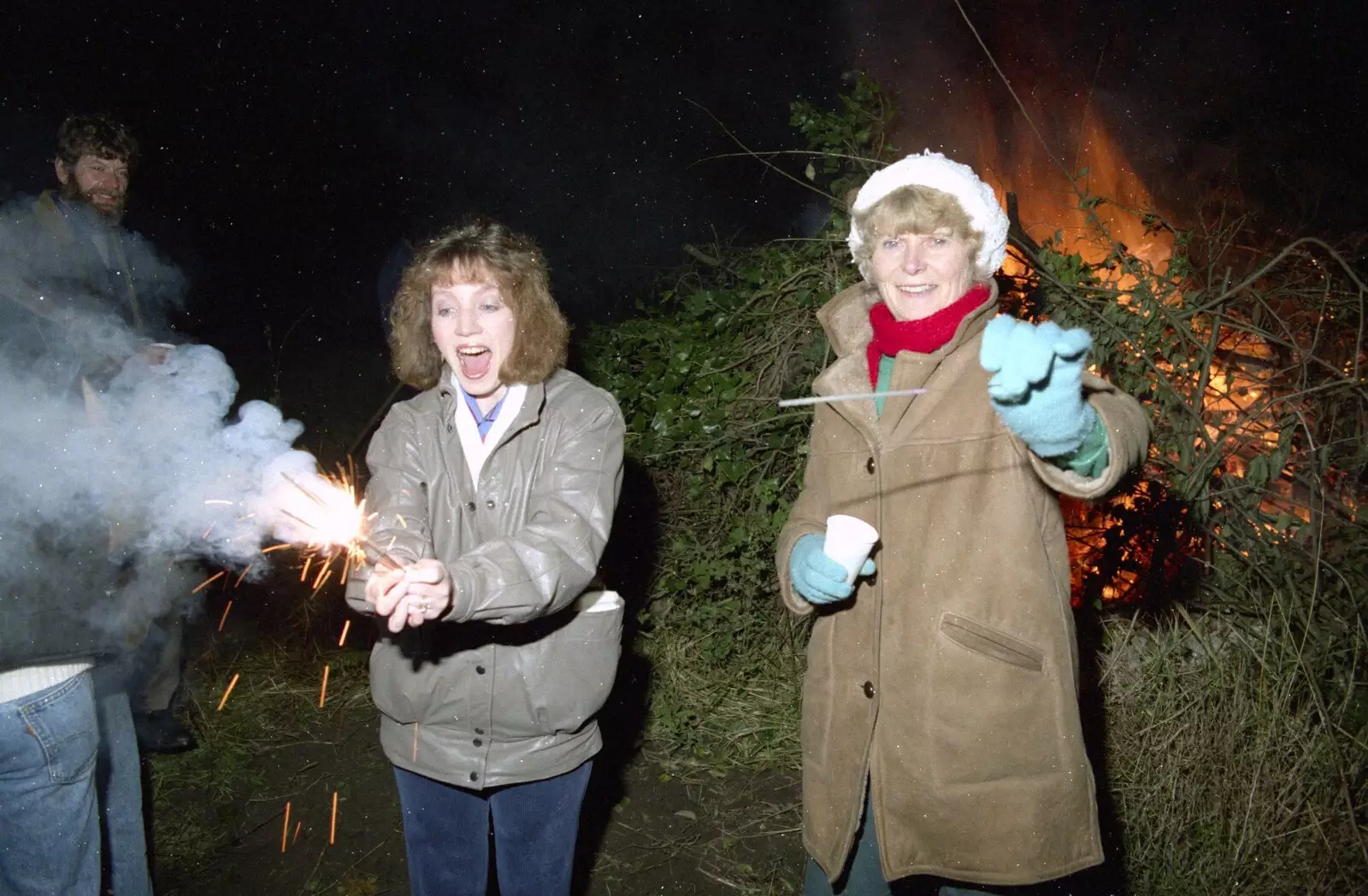 Monique shrieks as her sparkler goes off, from Bonfire Night and Printec at the Stoke Ash White Horse, Suffolk - 5th November 1991