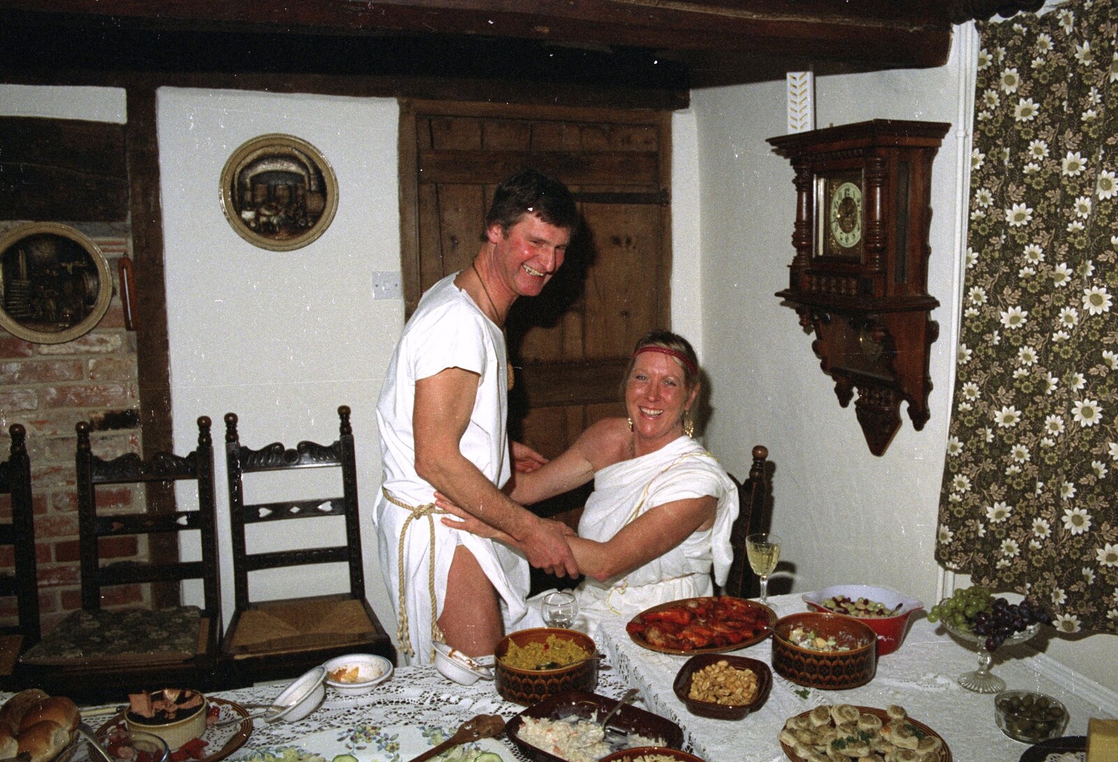 Geoff and Sue mess around from Geoff and Brenda's Pre-Christmas Toga Party, Stuston, Suffolk - 17th December 1991