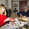 Mother inspects a present, Christmas in Devon and Stuston - 25th December 1991