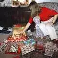 Mother is surrounded by a pile of presents, Christmas in Devon and Stuston - 25th December 1991