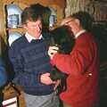 Geoff inspects the puppy, Christmas in Devon and Stuston - 25th December 1991