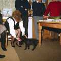 Monique says hello to the puppy, Christmas in Devon and Stuston - 25th December 1991
