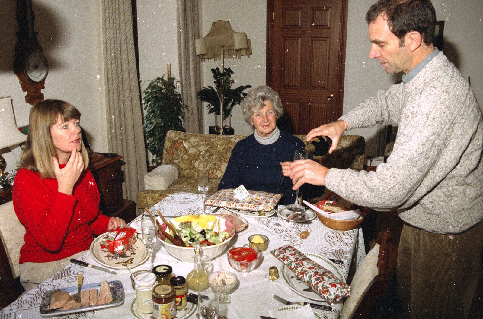 Mike pours some Champagne from Christmas in Devon and Stuston - 25th December 1991