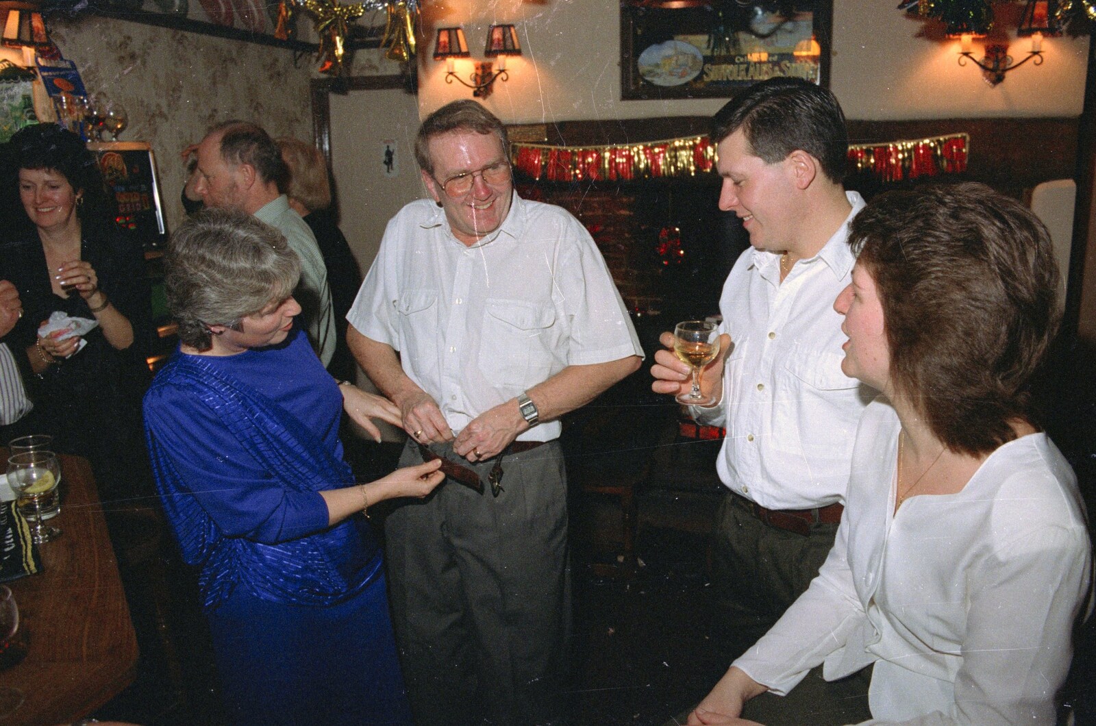 John Willy makes some adjustments from New Year's Eve at the Swan Inn, Brome, Suffolk - 31st December 1991