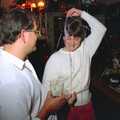 Roger and Pippa, who's covered in silly string, New Year's Eve at the Swan Inn, Brome, Suffolk - 31st December 1991