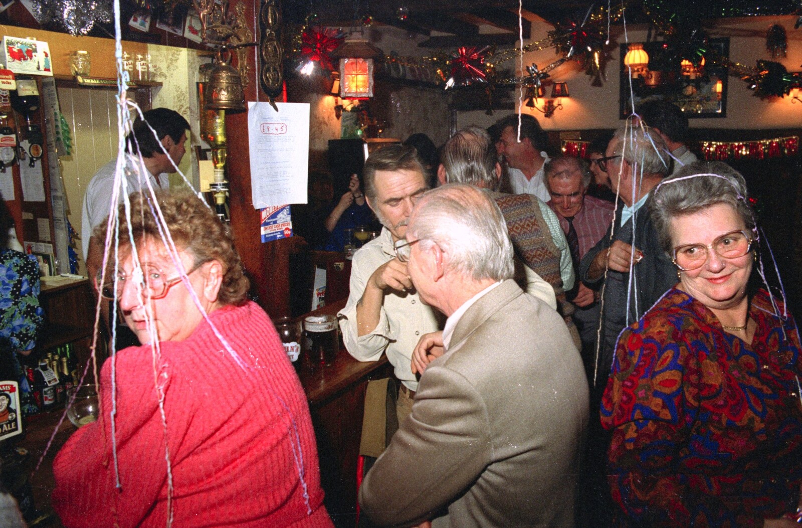 Arline looks around in a post-party-popper warzone from New Year's Eve at the Swan Inn, Brome, Suffolk - 31st December 1991