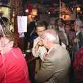 Arline looks around in a post-party-popper warzone, New Year's Eve at the Swan Inn, Brome, Suffolk - 31st December 1991