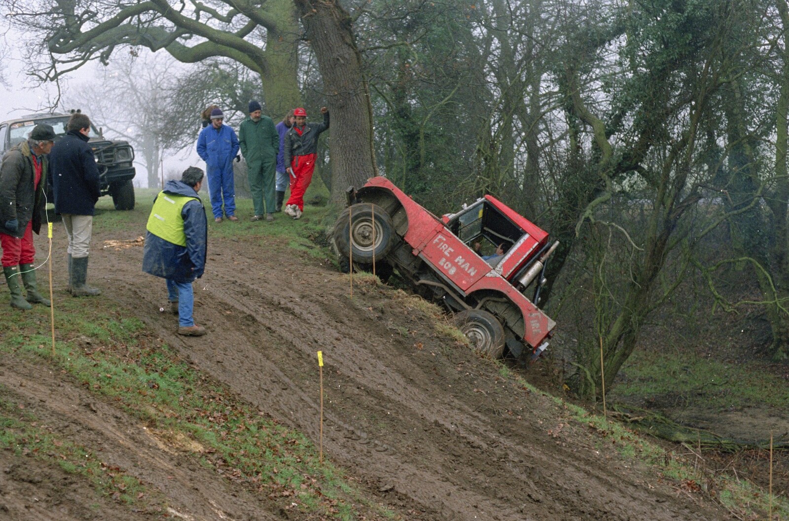 'Fire man Bob' climbs a steep hill from Printec at the Park Hotel, Diss, Norfolk - 14th January 1992