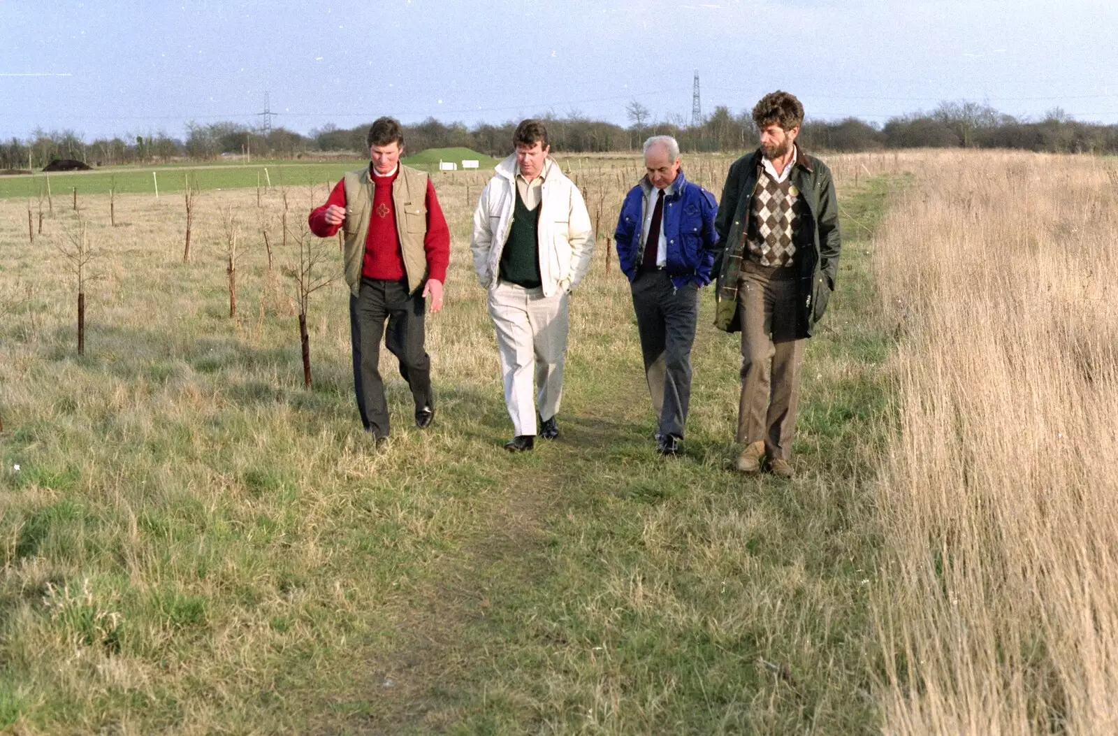 Geoff, Mick, ? and Mike stride around, from A Ceilidh and a Walk Across the Common, Stuston - 26th February 1992