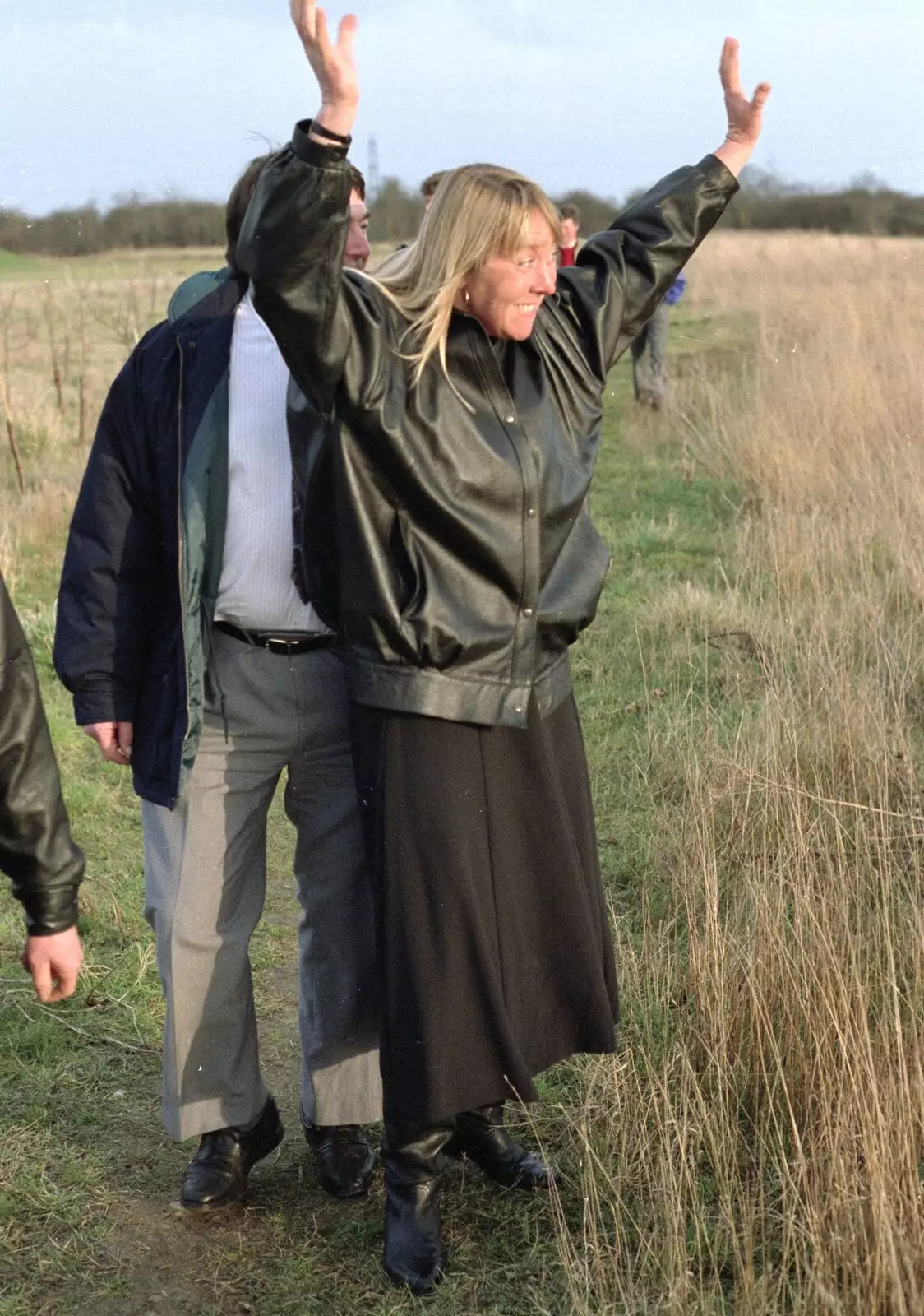 Sue waves to someone, from A Ceilidh and a Walk Across the Common, Stuston - 26th February 1992