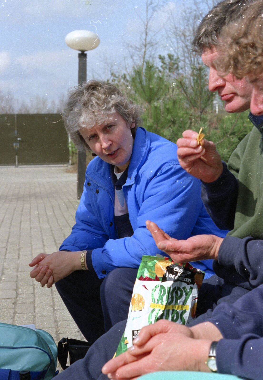A Trip to Center Parcs, Eemhof, Netherlands - 24th March 1992: Passing around a bag of 'crispy chips'