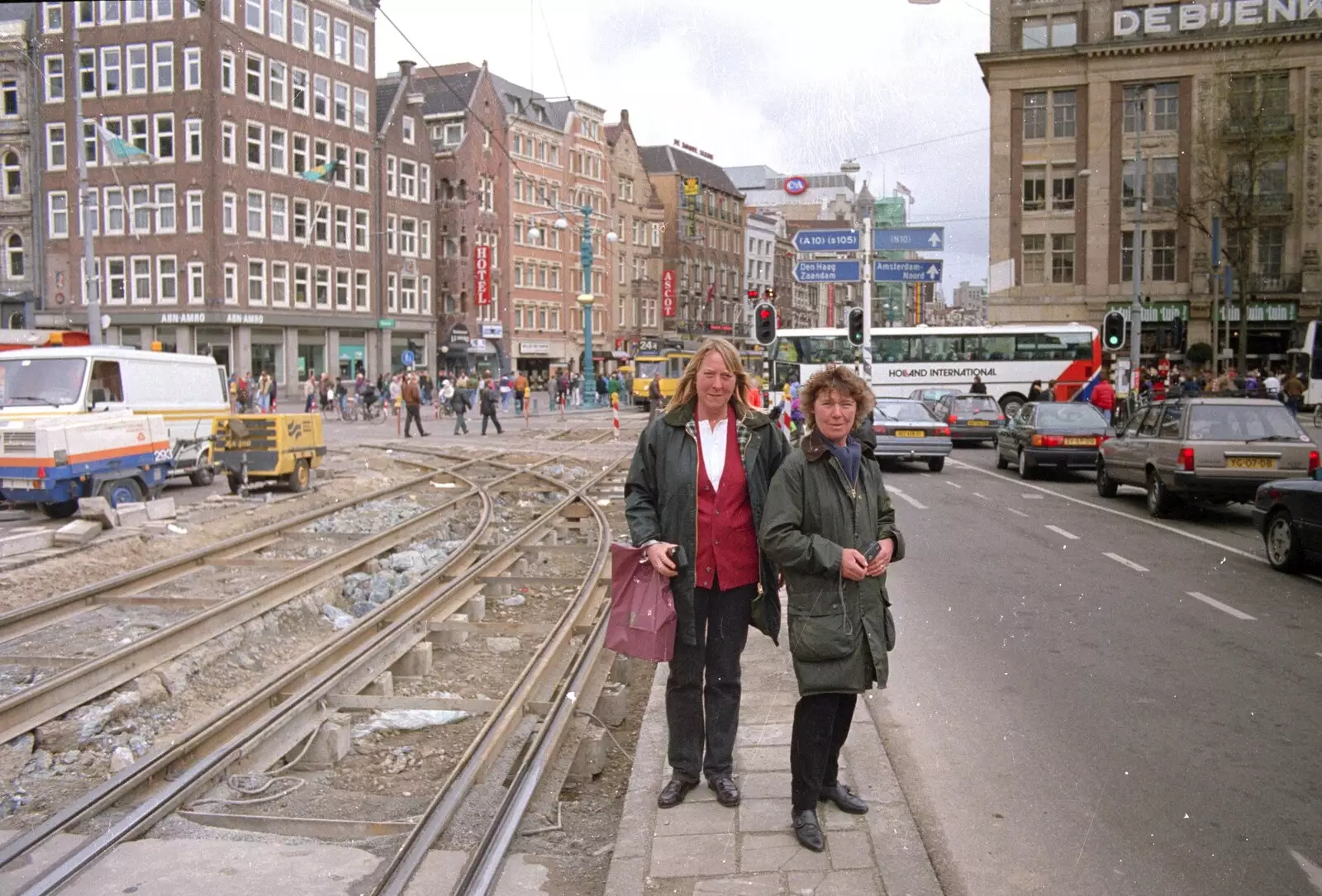 Sue and Brenda by some dug-up tram tracks, from Out and About in Amsterdam, Hoorne, Vollendam and Edam, The Netherlands - 26th March 1992