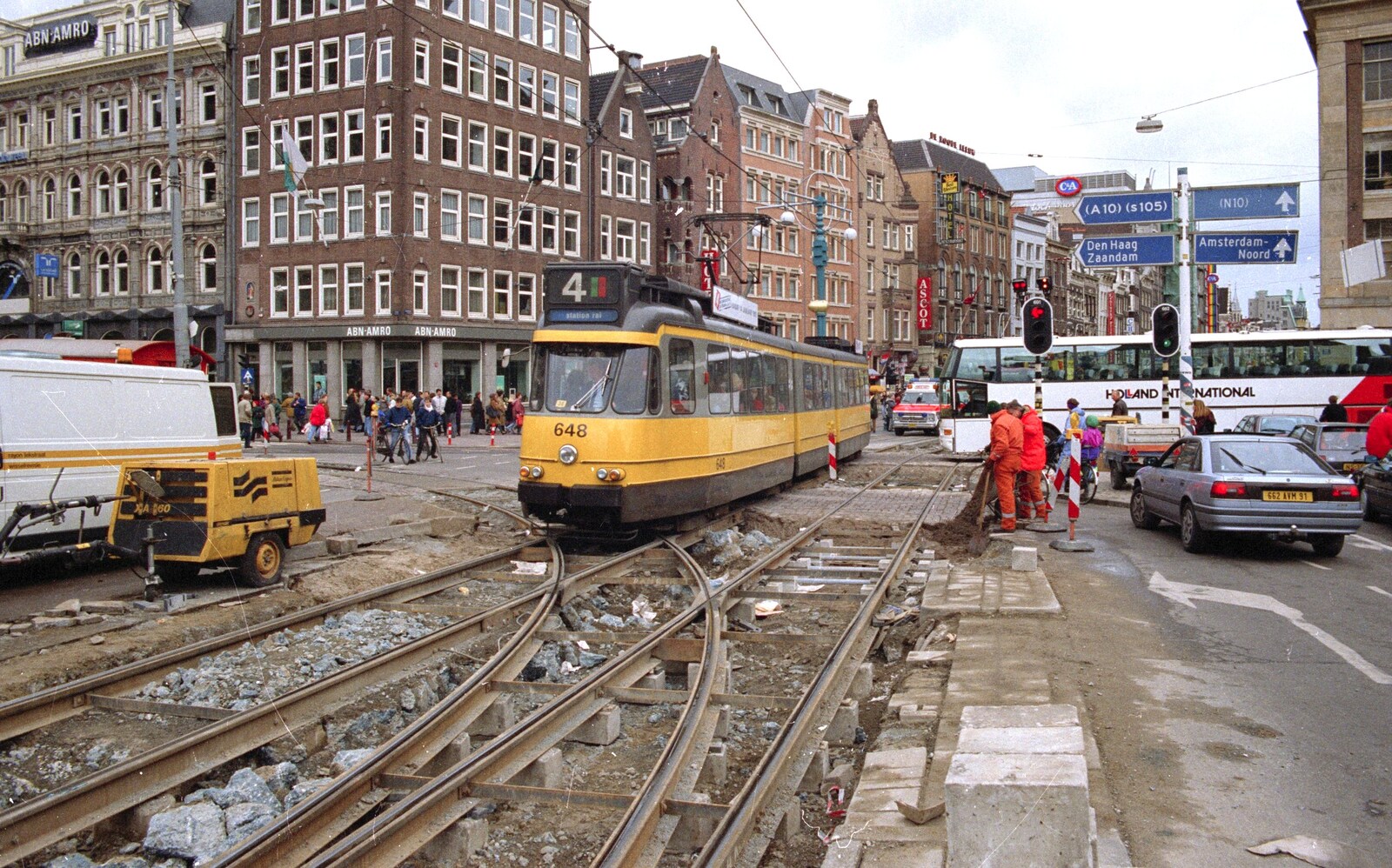 Out and About in Amsterdam, Hoorne, Vollendam and Edam, The Netherlands - 26th March 1992: A yellow Amsterdam tram