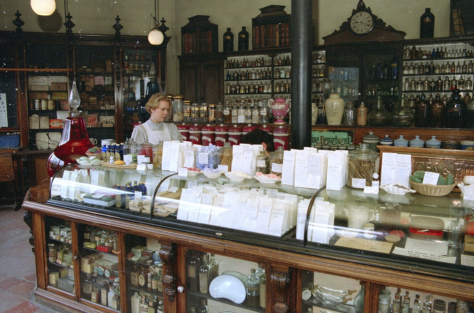 A girl in a Victorian apothecary from Capel Curig to Abergavenny: A Road-Trip With Hamish, Wales - 3rd April 1992