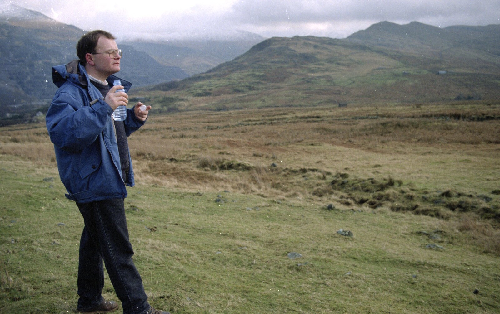Hamish sips some water and surveys the view from Capel Curig to Abergavenny: A Road-Trip With Hamish, Wales - 3rd April 1992