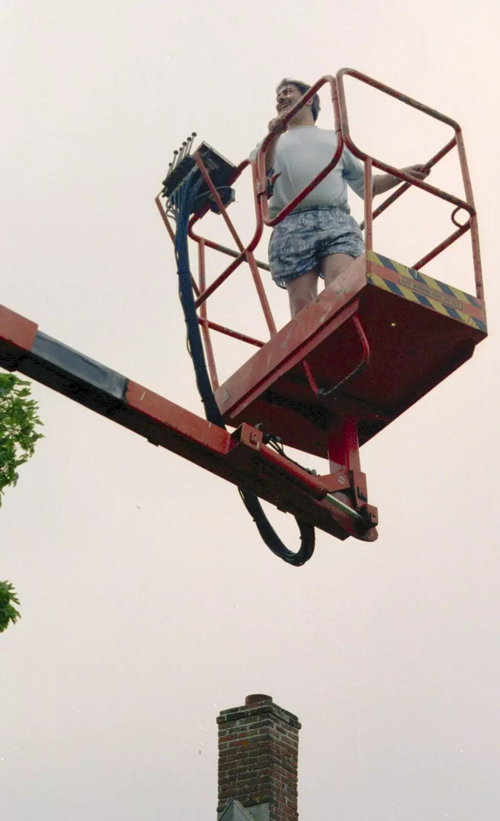 Local radio DJ David Hoffman is up in the air, from The Election Caravan and a View from a Cherry Picker, Stuston, Suffolk - 9th April 1992