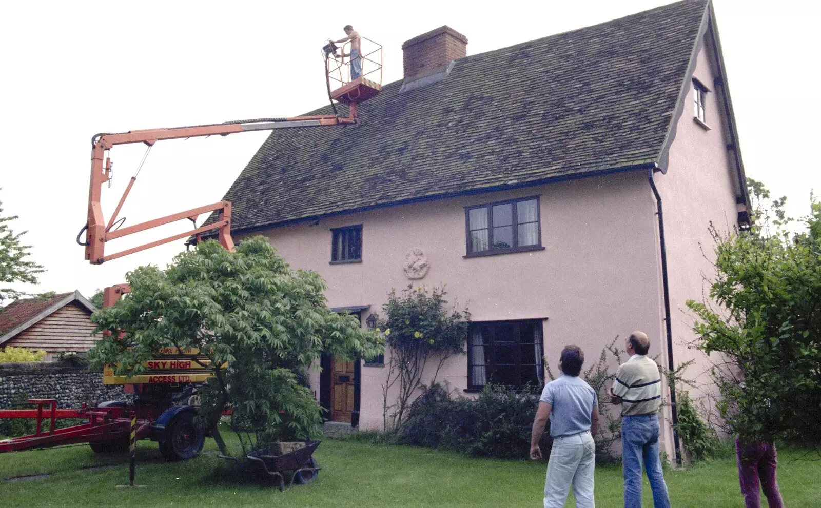 Geoff gets up to his chimney, from The Election Caravan and a View from a Cherry Picker, Stuston, Suffolk - 9th April 1992