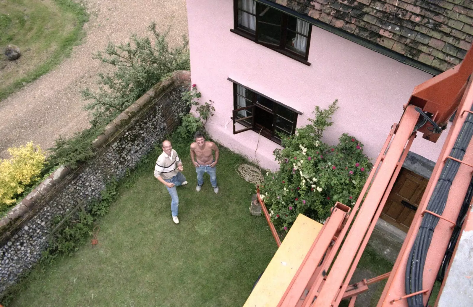 Nosher has a go and looks down below, from The Election Caravan and a View from a Cherry Picker, Stuston, Suffolk - 9th April 1992