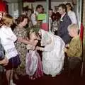 A small bridesmaid gets a kiss, Printec Kelly's Wedding, Eye, Suffolk - 25th April 1992