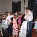 A flock of children join in or throw stuff or something, Printec Kelly's Wedding, Eye, Suffolk - 25th April 1992