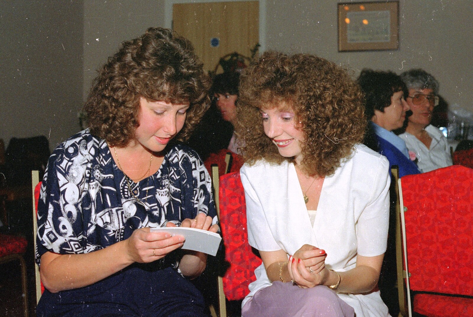 Alison and Monique read cards from Printec Kelly's Wedding, Eye, Suffolk - 25th April 1992