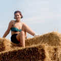 Sittin' on the top of the bale