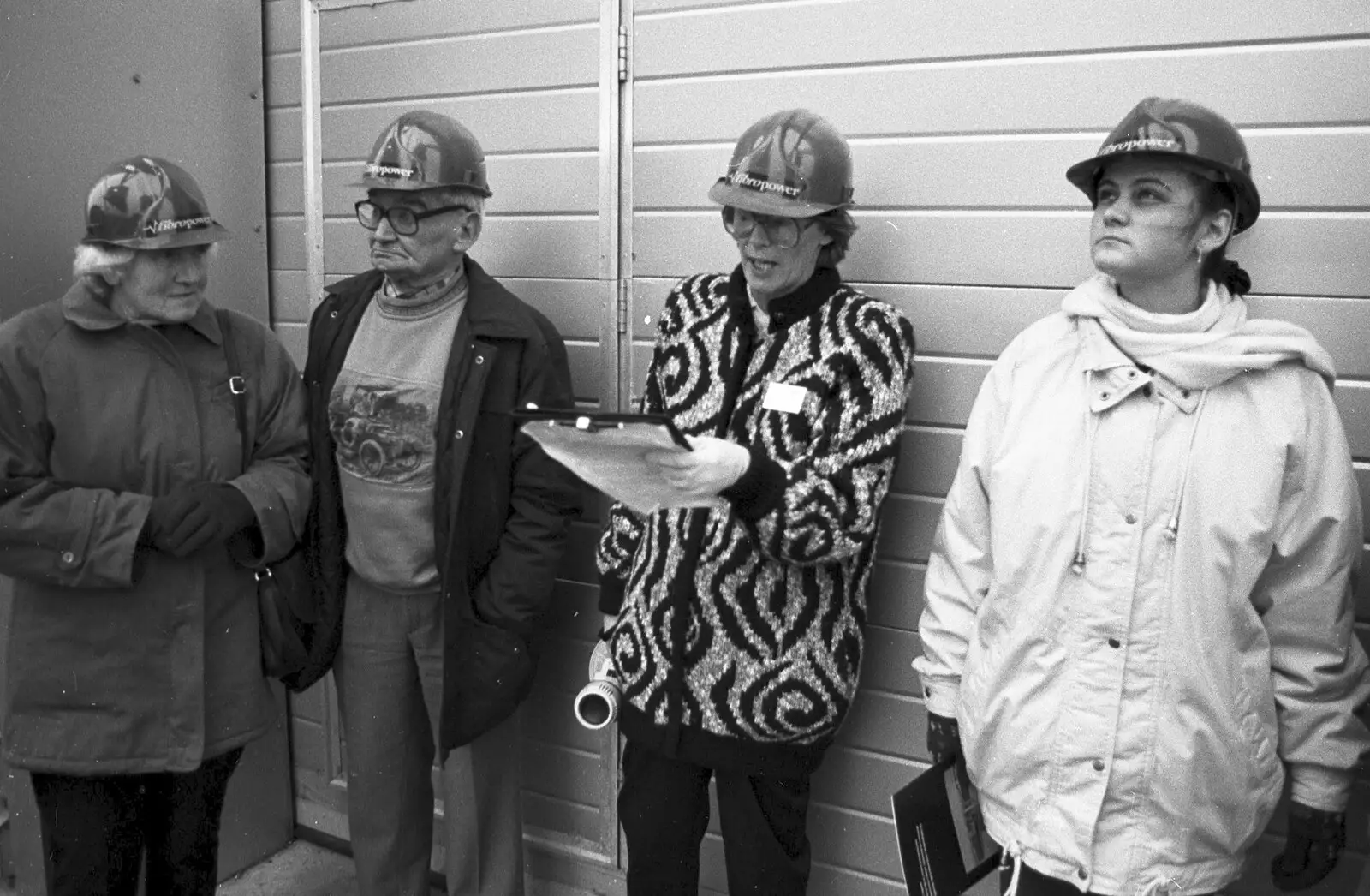 The tour guide reads something out, from The World's First "Chicken Shit" Power Station, Brome, Eye, Suffolk - 11th July 1992