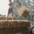 Sarah throws a bale down, Working on the Harvest, Tibenham, Norfolk - 11th August 1992