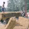 Rachel chucks bales around in the shed, Working on the Harvest, Tibenham, Norfolk - 11th August 1992