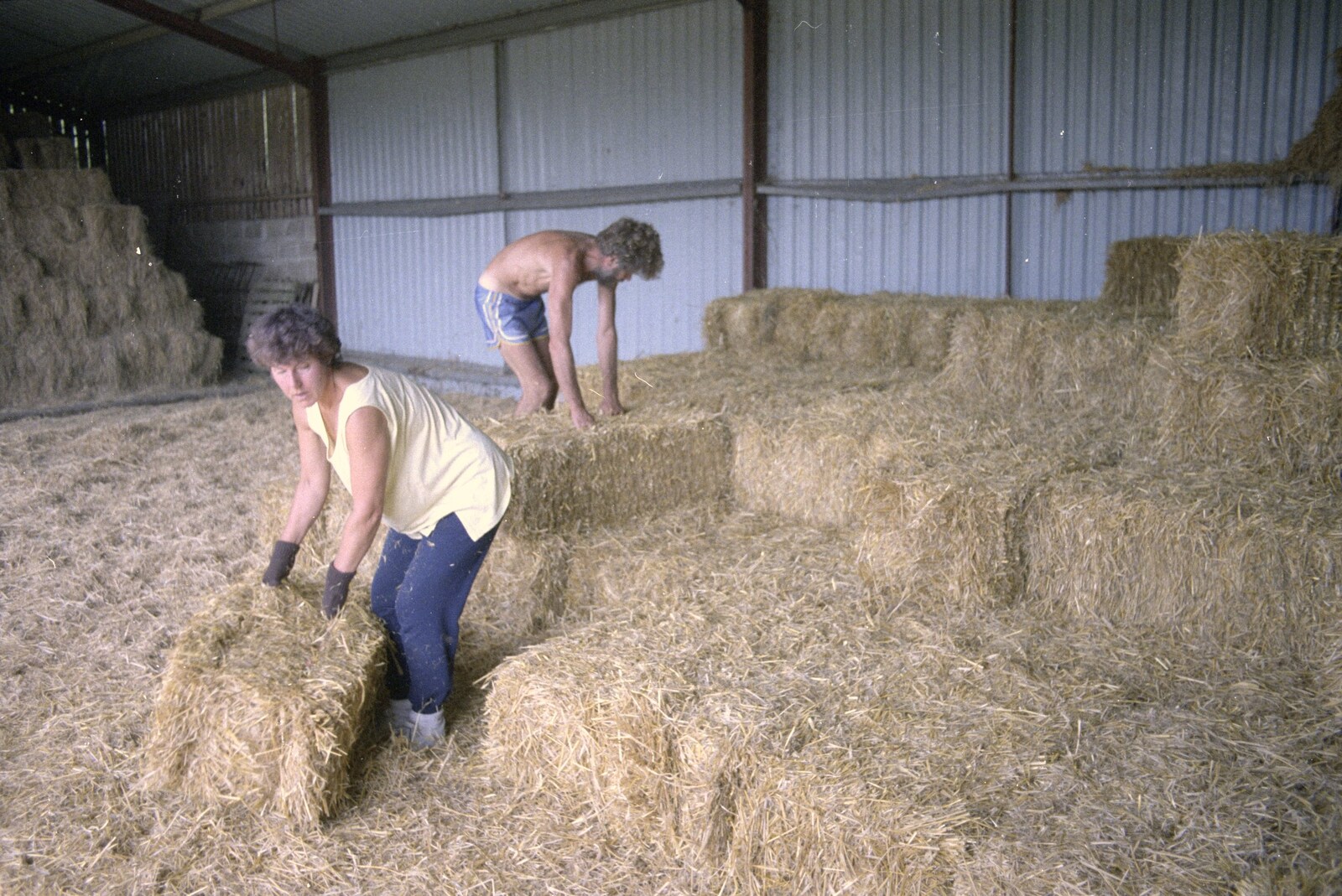 Working on the Harvest, Tibenham, Norfolk - 11th August 1992: Sue and Mike stack bales