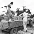 Rachel and Sarah consider the trailer, Working on the Harvest, Tibenham, Norfolk - 11th August 1992