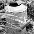 An old watering can looks like it has barnacles, A Black and White Life in Concrete, Stuston, Suffolk - 3rd September 1992