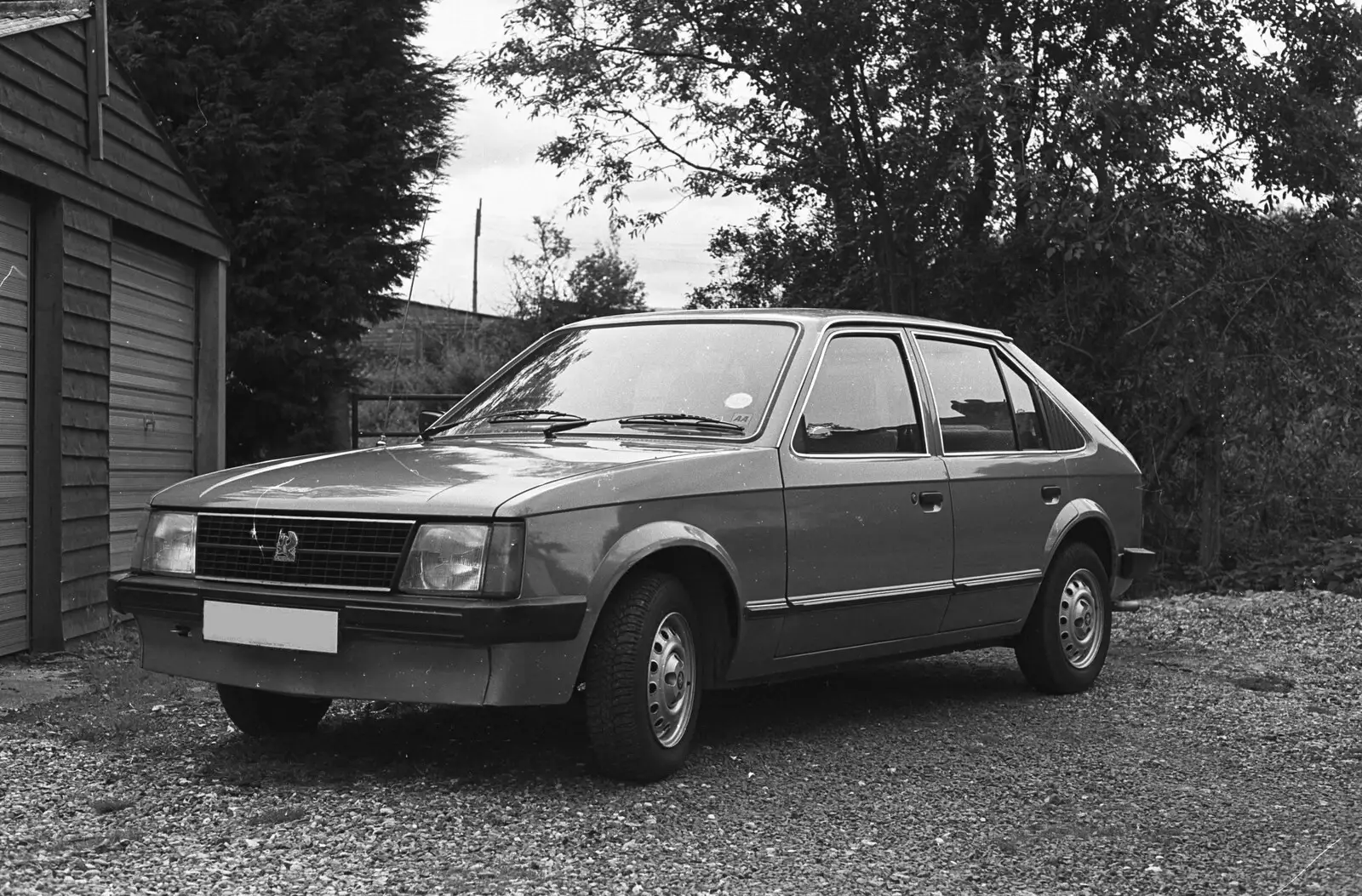 Nosher's Astra by the garage, from A Black and White Life in Concrete, Stuston, Suffolk - 3rd September 1992