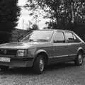 Nosher's Astra by the garage, A Black and White Life in Concrete, Stuston, Suffolk - 3rd September 1992