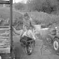 Linda gets wheeled about in a barrow, Cider Making in Black and White, Stuston, Suffolk - 11th October 1992